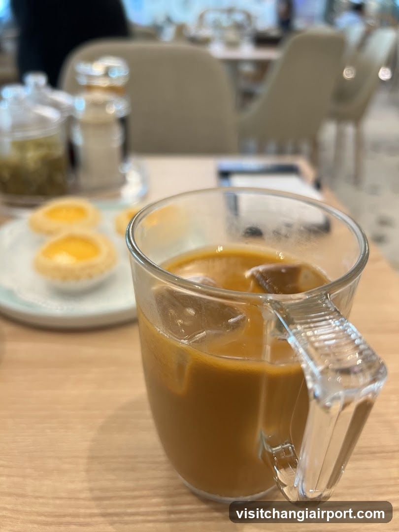 Iced Coffee and Egg Tarts at a Cafe