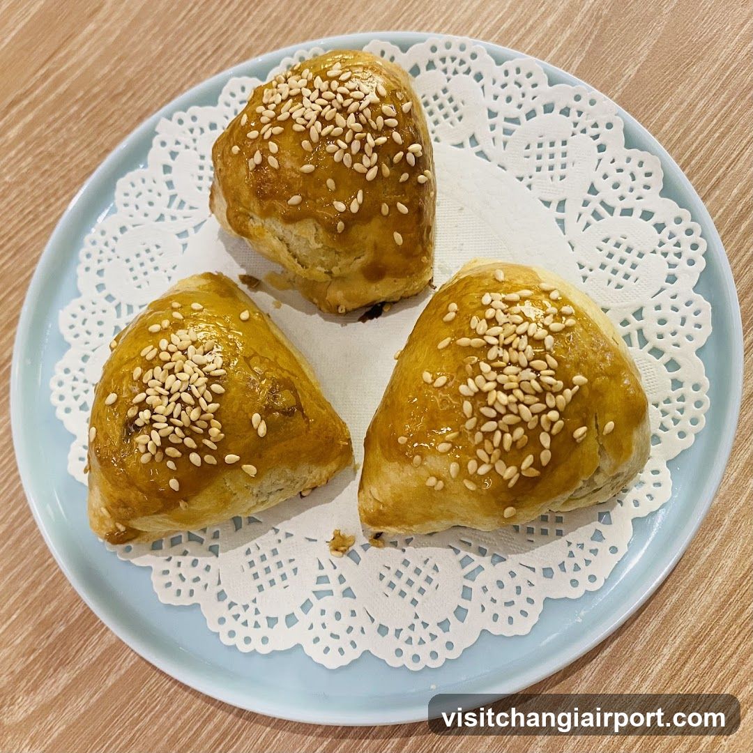 Sesame Seed Pastries on Blue Plate