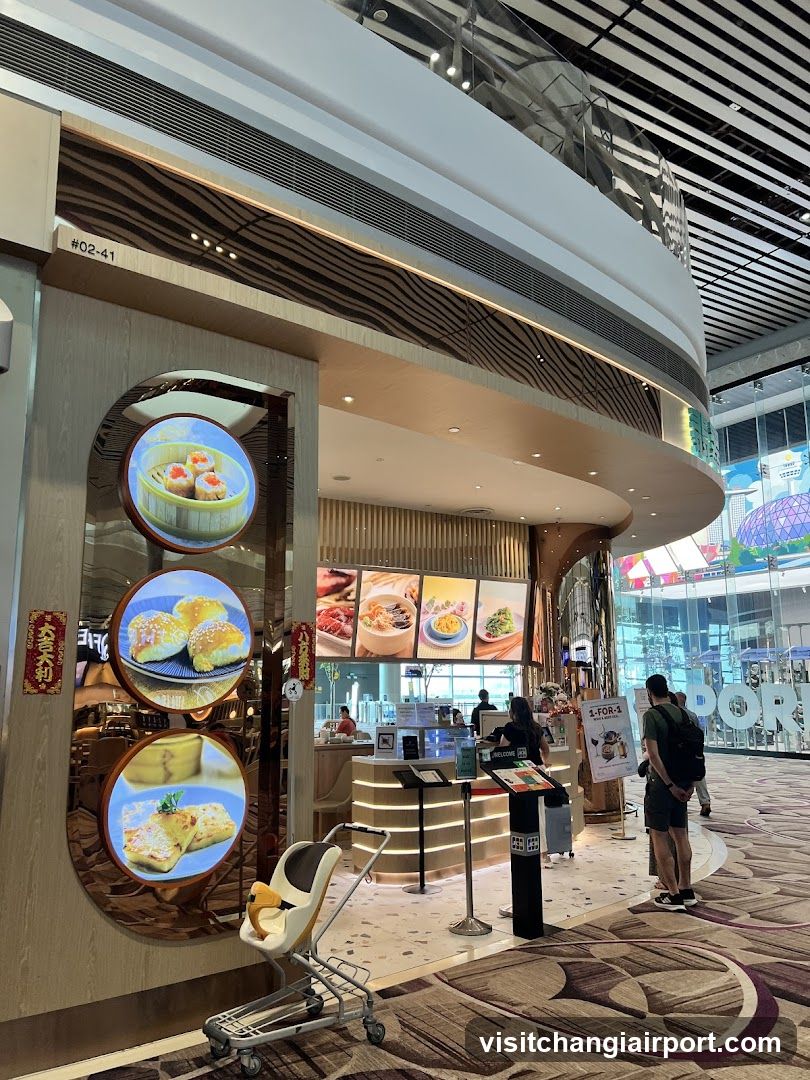 Food Court Interior with Display Screens and Counter