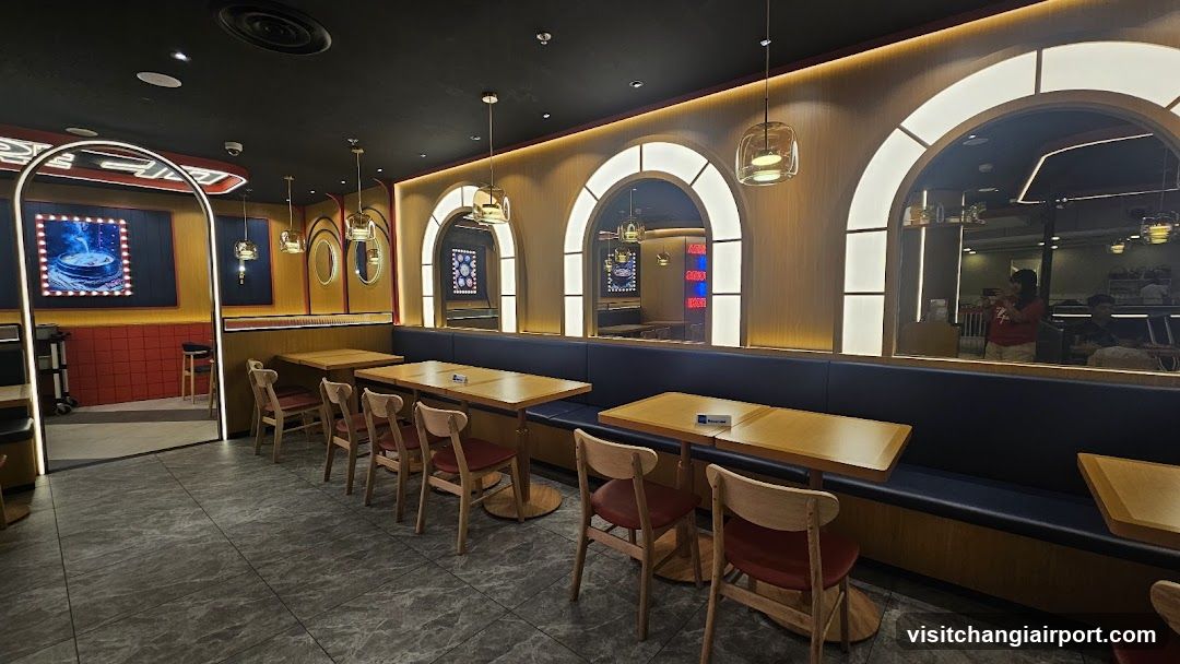 Restaurant Interior with Arched Windows and Booth Seating