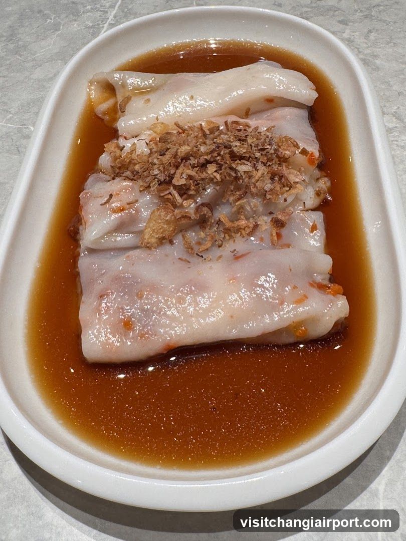 Steamed Rice Rolls with Sauce and Crispy Toppings