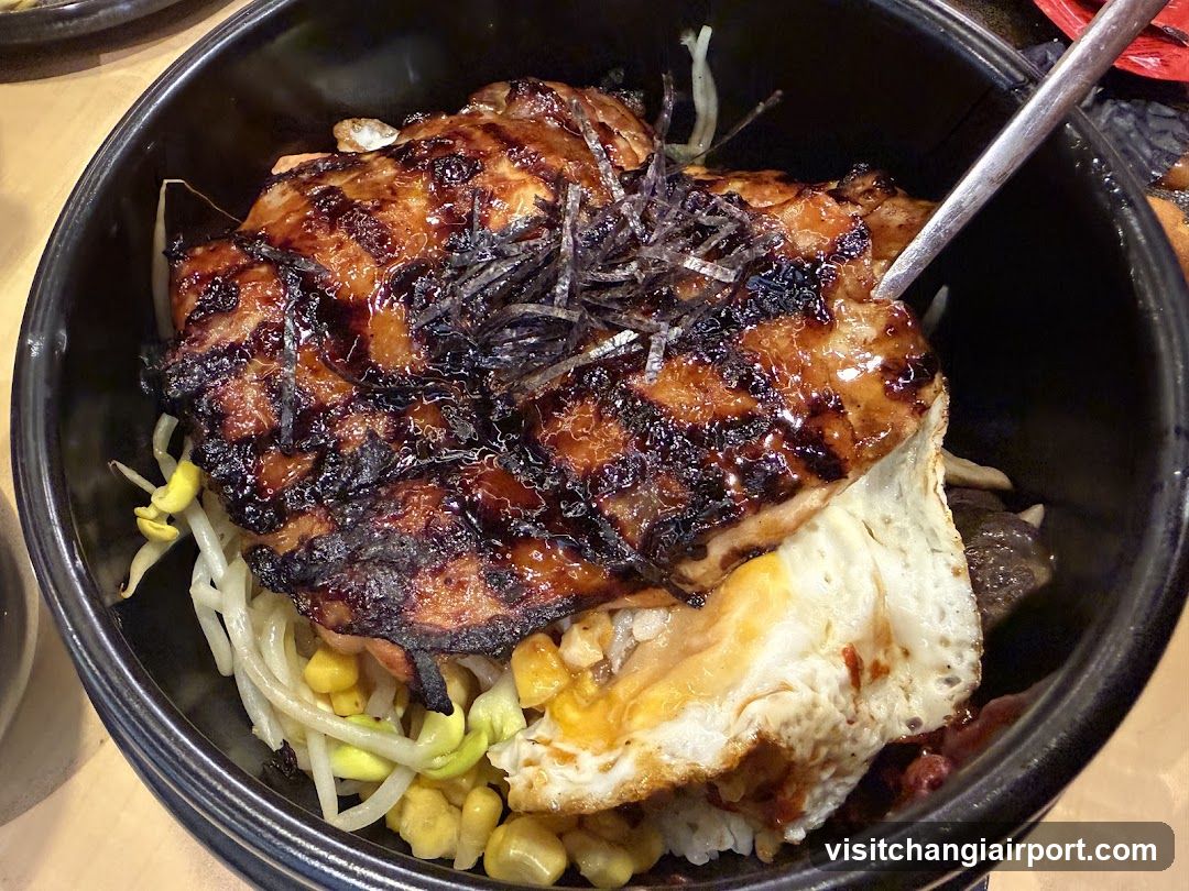 Grilled Chicken Rice Bowl with Fried Egg and Corn