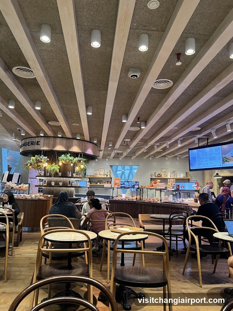 Bakery Interior with Wooden Ceiling and Seating Area