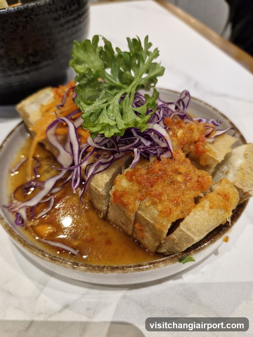 Sliced Fried Tofu with Garlic Sauce and Cabbage Slaw