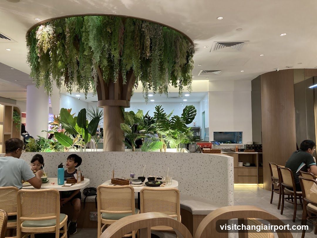 Interior of a modern restaurant with greenery