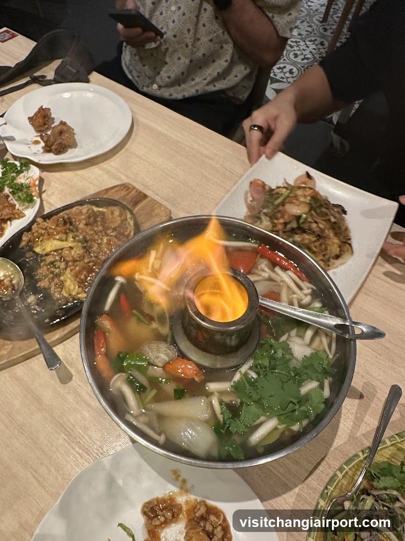 Dining Table with Hot Pot and Side Dishes