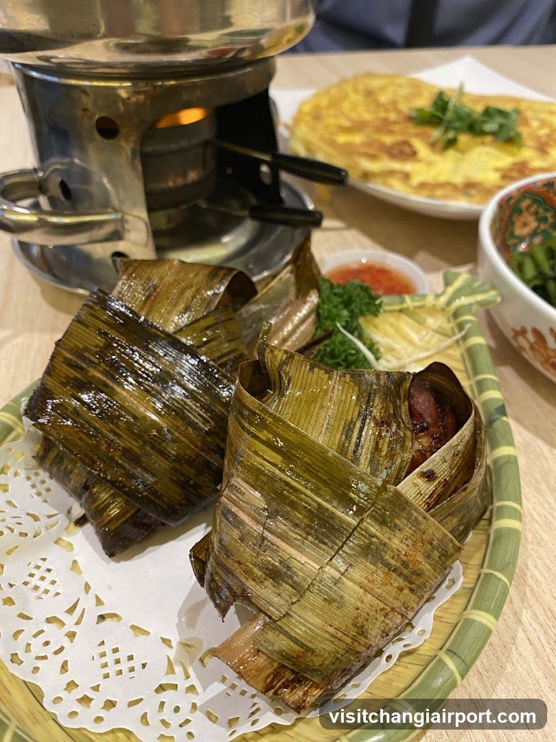 Bamboo-wrapped food dish with side dishes and cooking setup