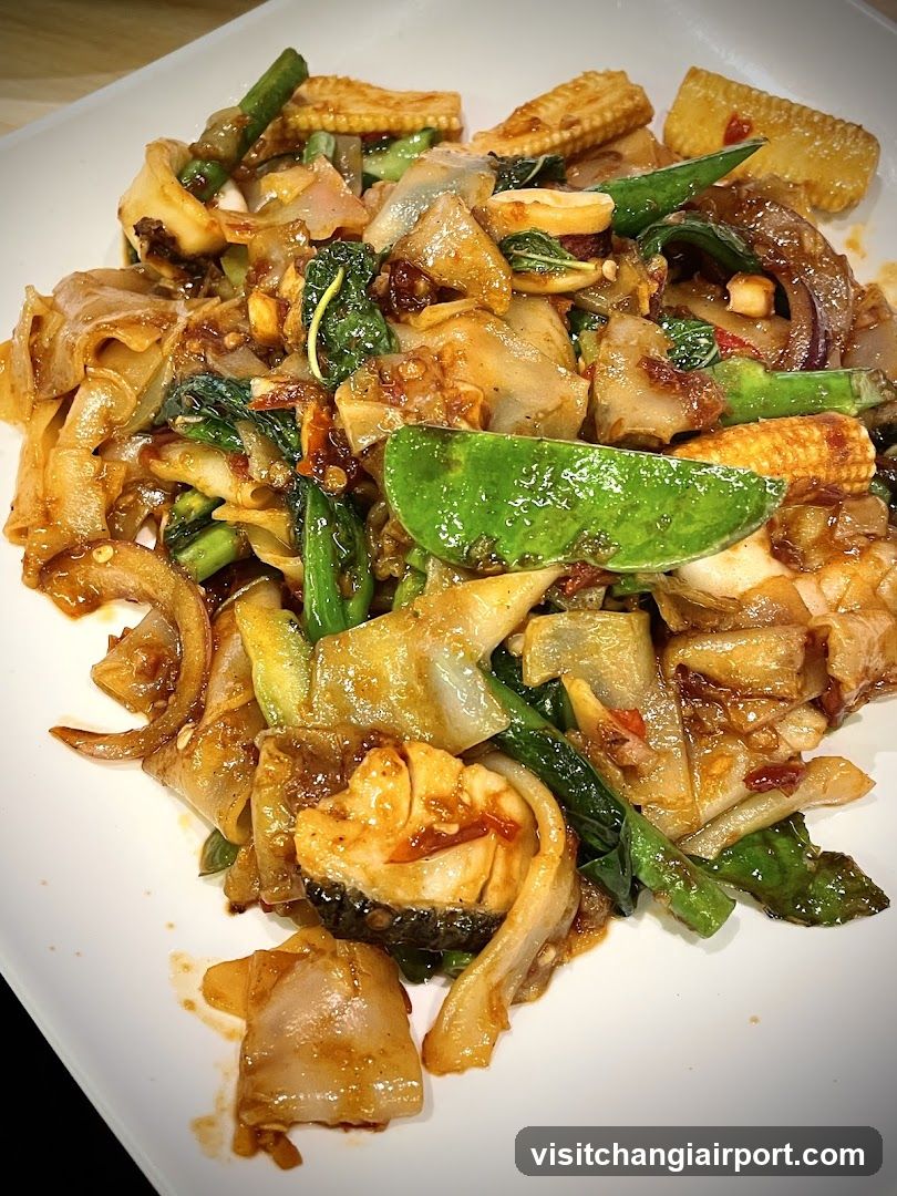 Stir-fried Noodles with Vegetables and Fish