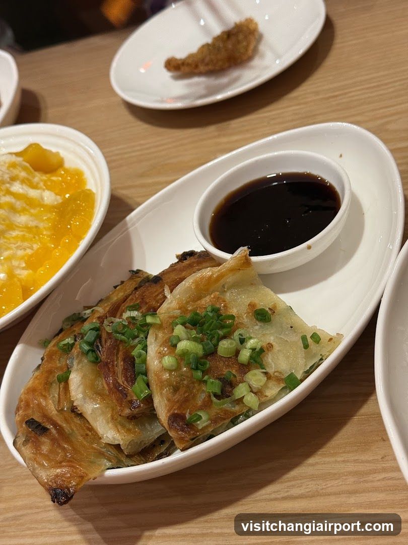 Pan-fried Dumplings with Sauce and Mango Salad