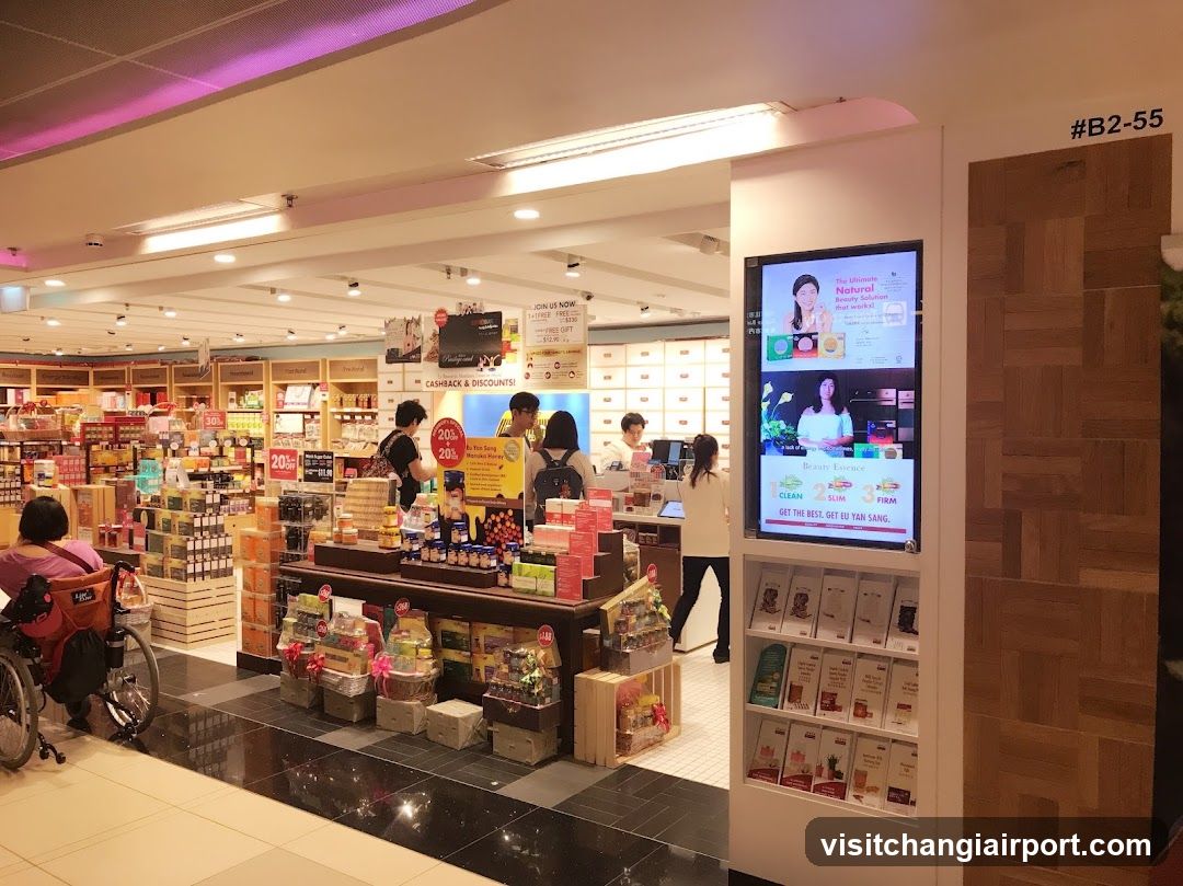 Interior of a retail store with promotional displays and digital signage.
