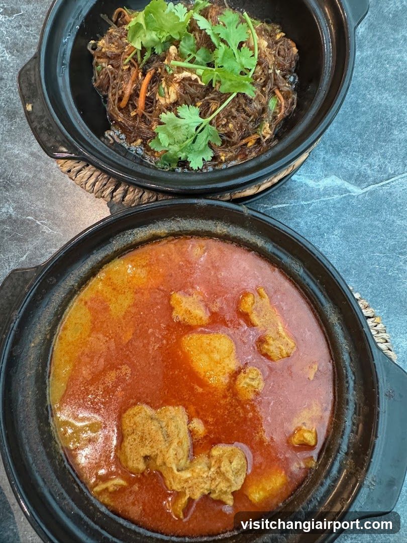 Two Clay Pots of Food