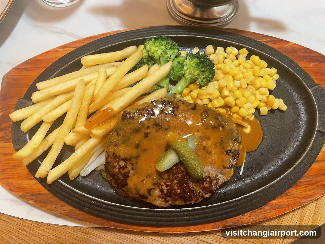 Sizzling Steak Plate with Fries, Corn and Broccoli