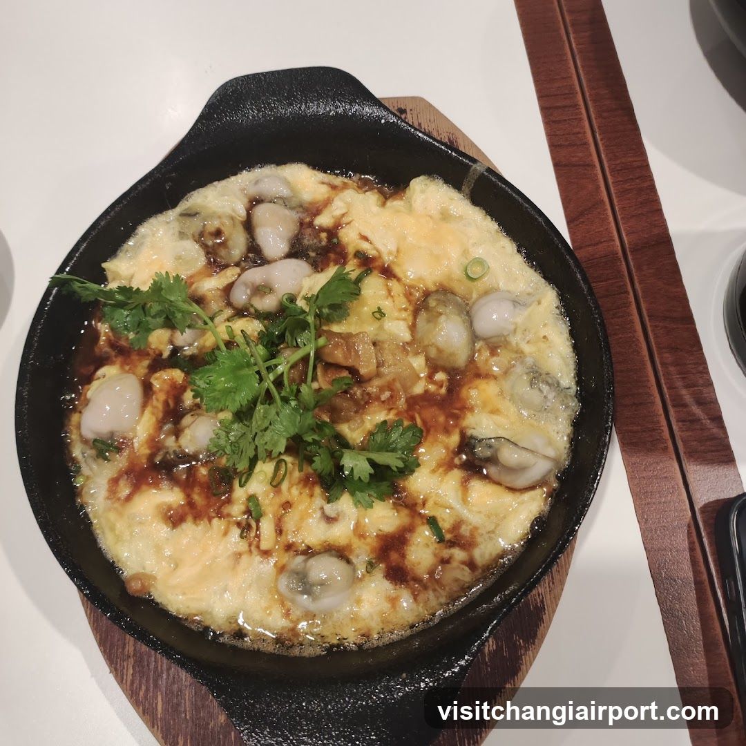 Sizzling Oyster and Egg Dish