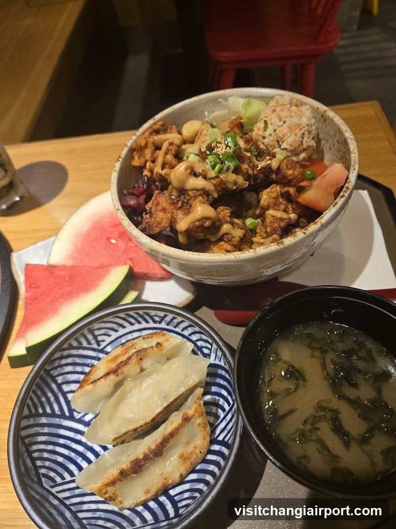 Japanese-style meal with gyoza and rice bowl