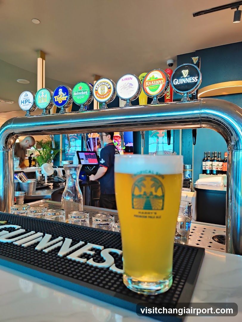 Beer Taps and Pint at Bar Counter