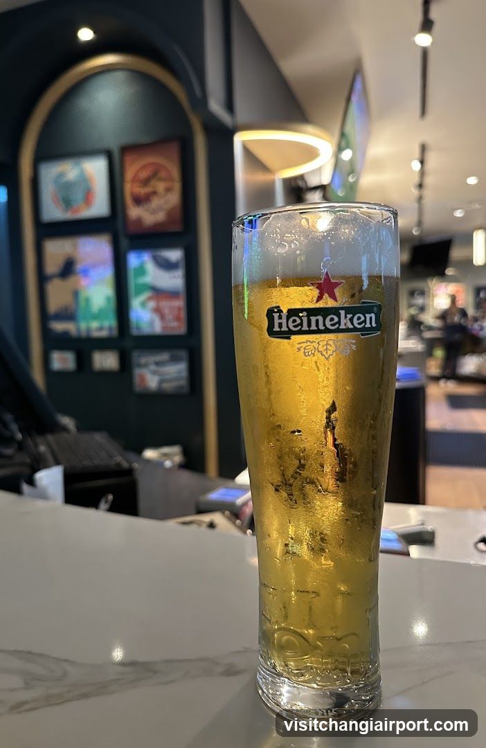 Heineken Beer Glass in Bar Interior