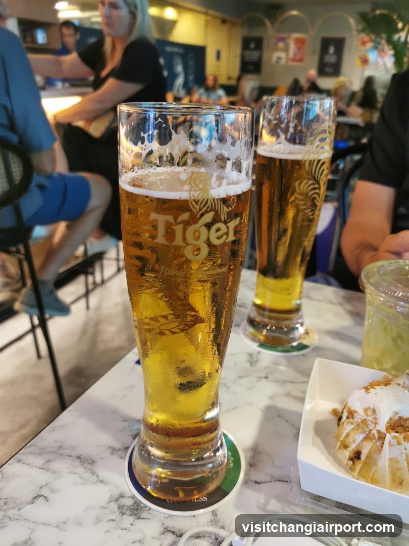 Tiger Beer and Dessert at a Bar