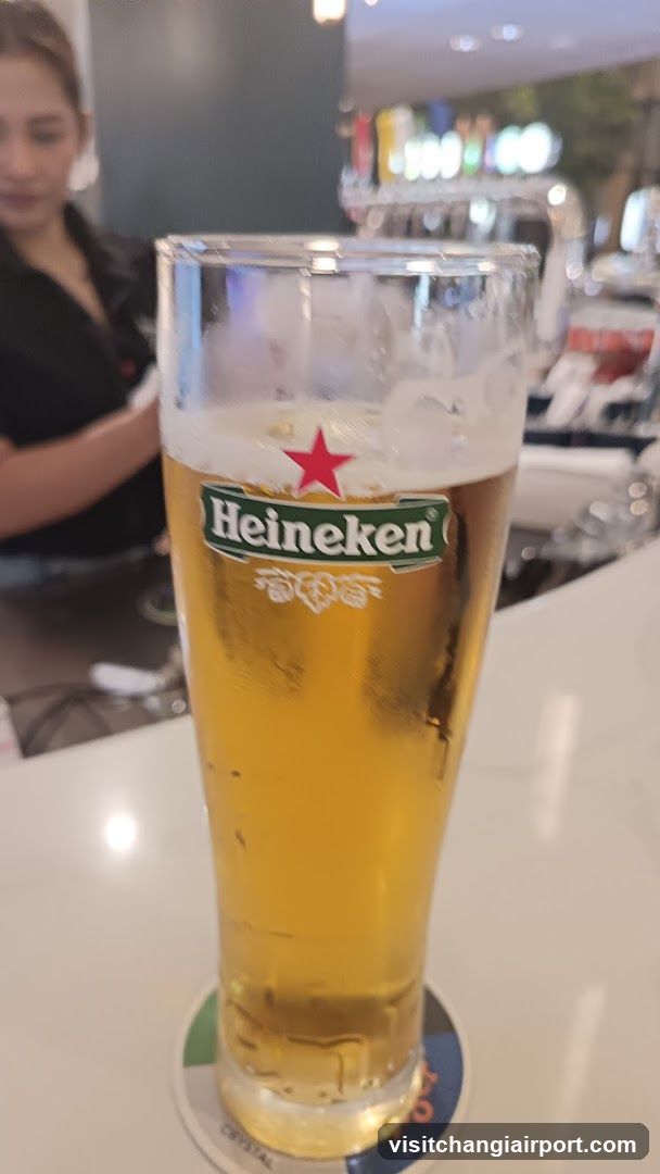 Heineken Beer Glass at Bar Counter