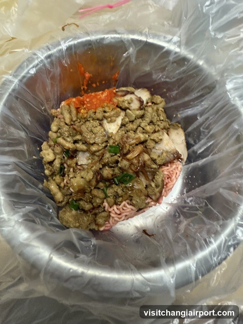 Bowl of Spicy Ground Meat Noodles